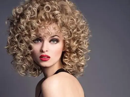 Curly Blonde Bombshell Hairstyle