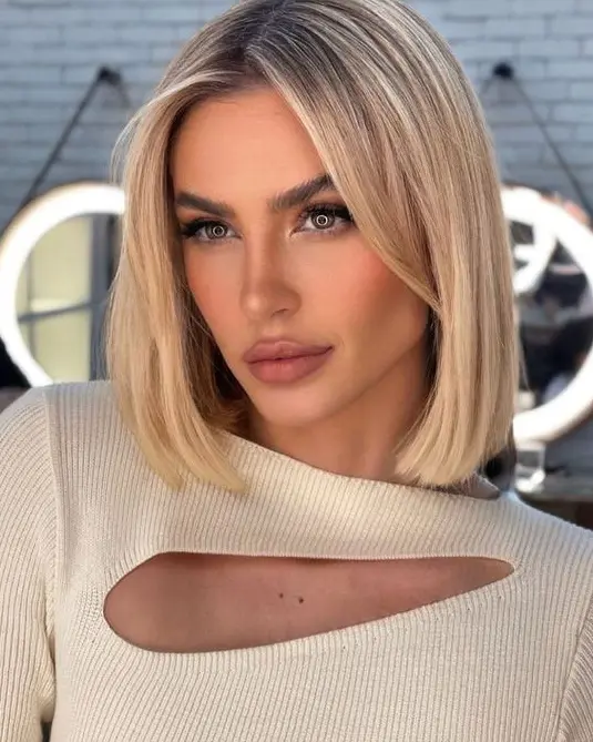 Sleek Blonde Bob with Center Part Hairstyle