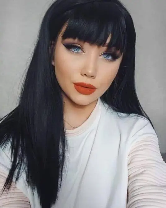 Long Black Hair with Soft Bangs Hairstyle