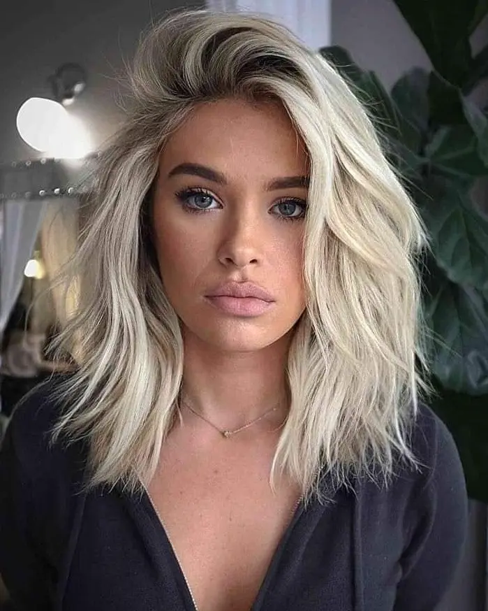 Textured Platinum Blonde Waves Hairstyle