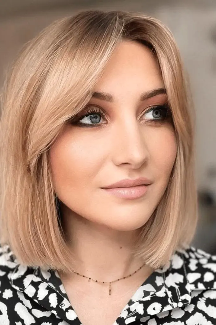 Blunt Blonde Bob with Curtain Bangs Hairstyle