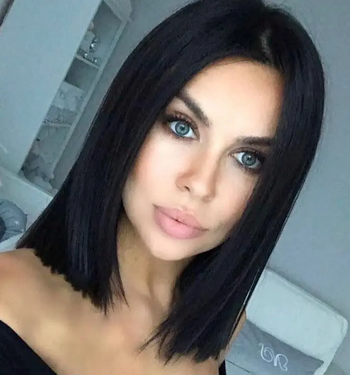 Sleek Black Bob with Center Part Hairstyle