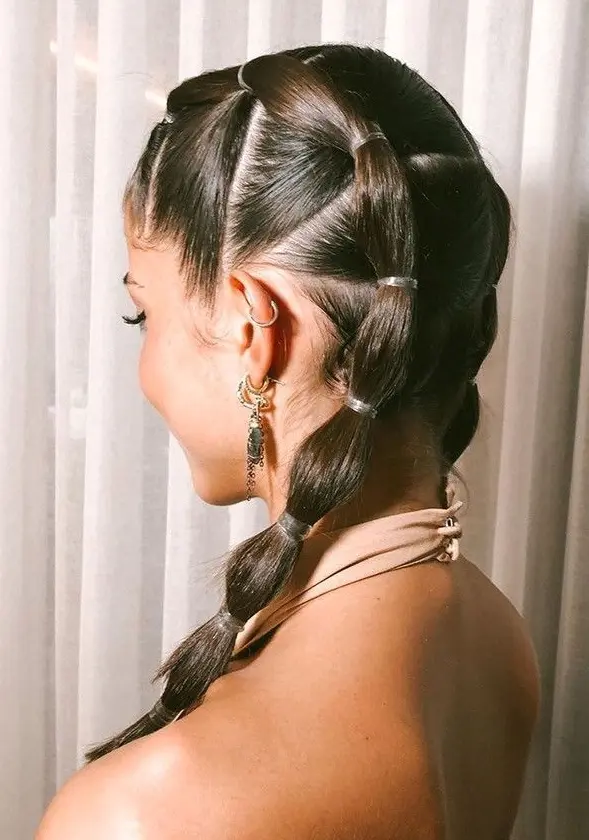 Bubble Braids with Metallic Accents Hairstyle