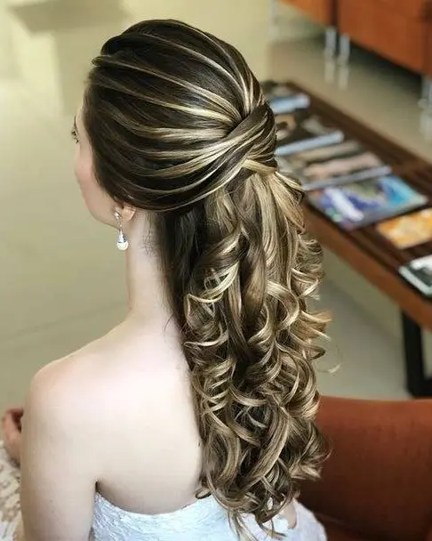 Twisted Low Ponytail with Curls Hairstyle