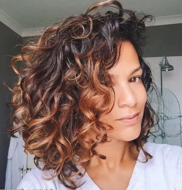 Curly Bob with Copper Highlights Hairstyle