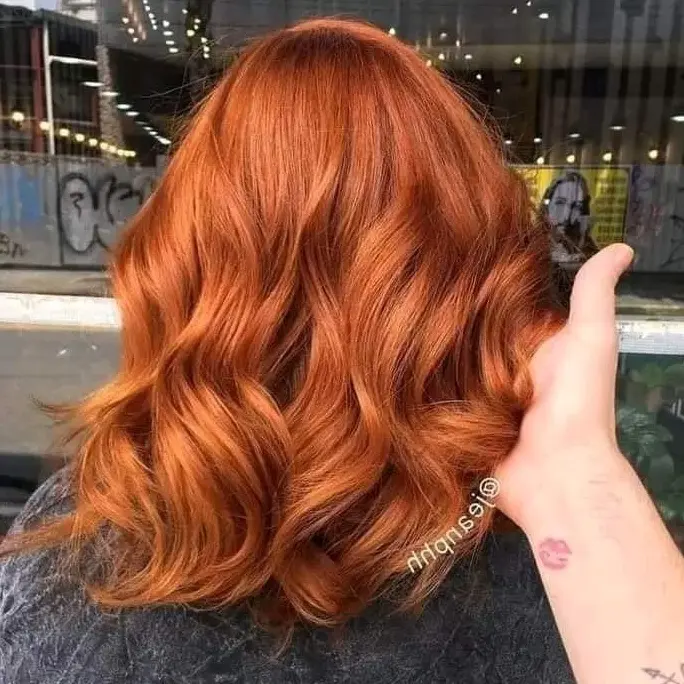 Vibrant Copper Waves on Brown Hair Hairstyle