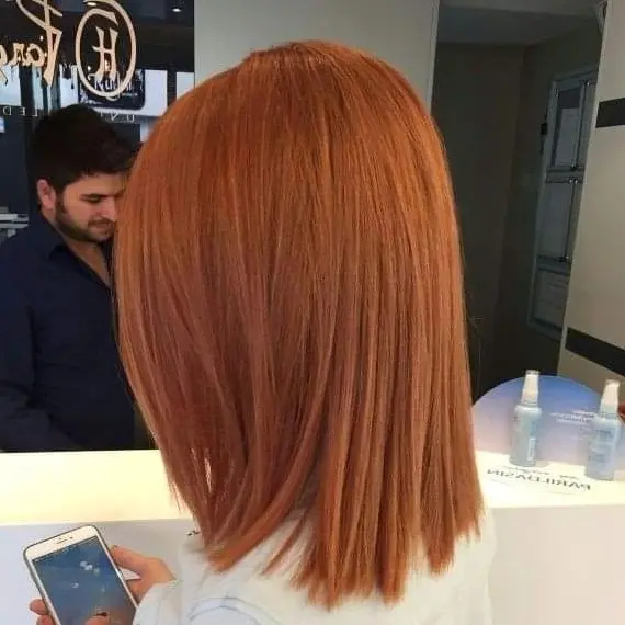 Sleek Ginger Lob Hairstyle