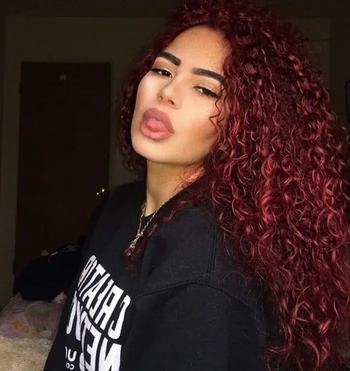 Voluminous Burgundy Curls Hairstyle