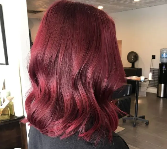 Glossy Burgundy Waves Hairstyle