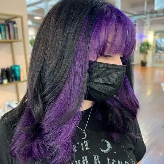 Purple Highlights with Curtain Bangs