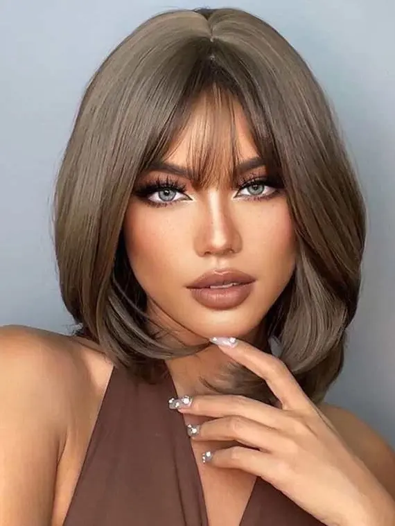 Elegant Caramel Brown Bob with Curtain Bangs Hairstyle