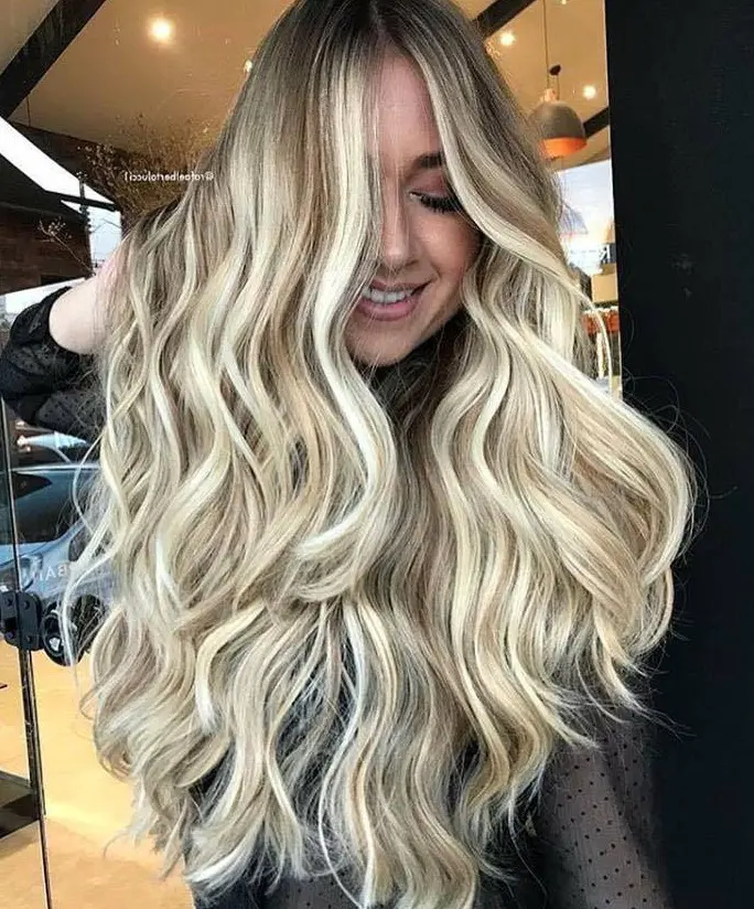 Blonde Waves with Silver Hues Hairstyle