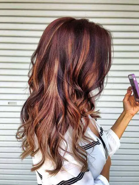 Rose Gold Highlights on Wavy Hair Hairstyle