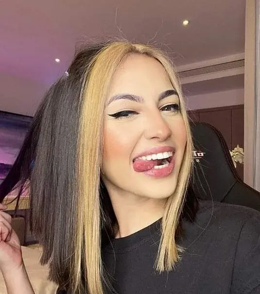 Bold Blonde and Black Highlights Hairstyle