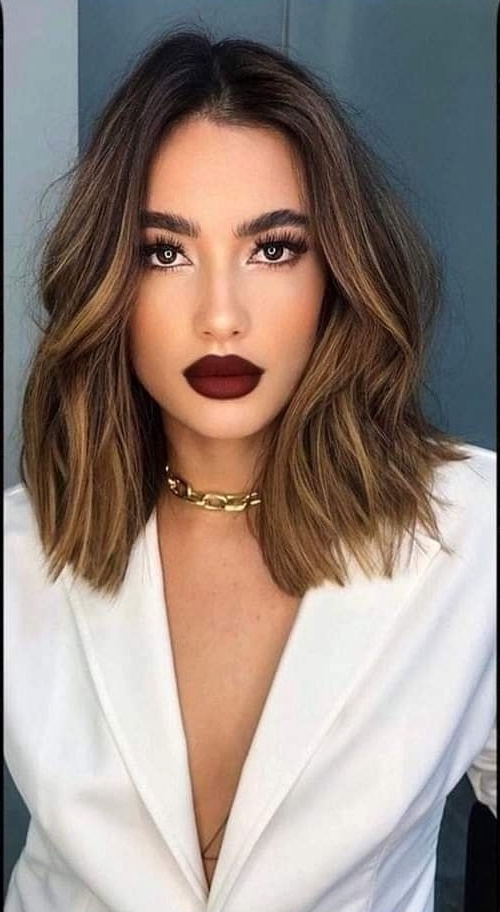 Bold Brunette Lob with Highlights Hairstyle