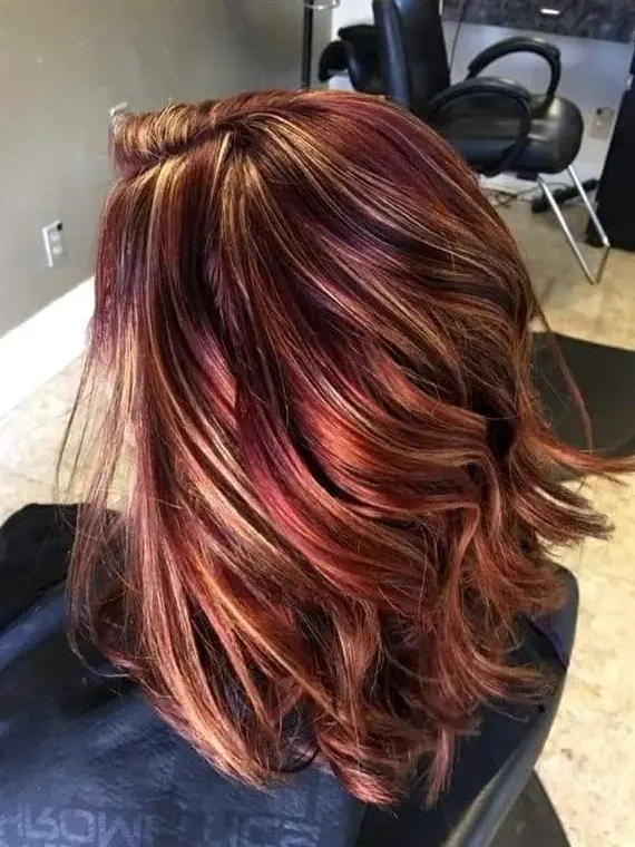 Red and Blonde Highlights on Wavy Hair Hairstyle