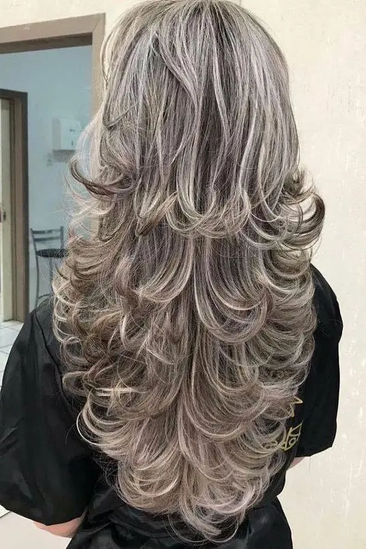 Voluminous Waves with Ash Blonde Highlights Hairstyle