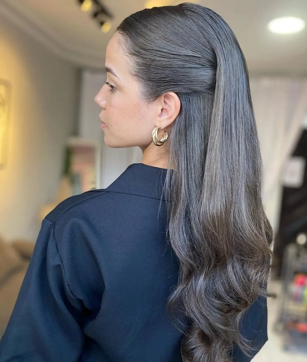 Sleek Waves with Half-Up Style Hairstyle