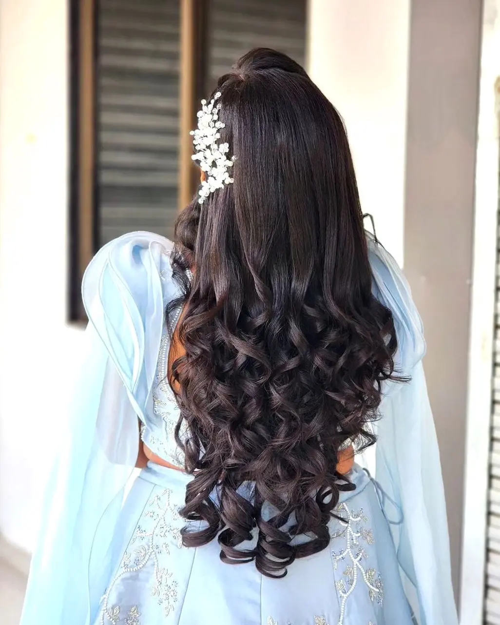 Classic Curls with Floral Embellishments